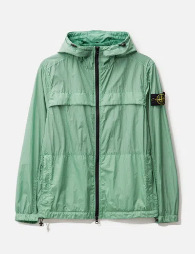 Stone Island Logo-appliquéd Crinkle Reps Nylon Hooded Jacket In Green