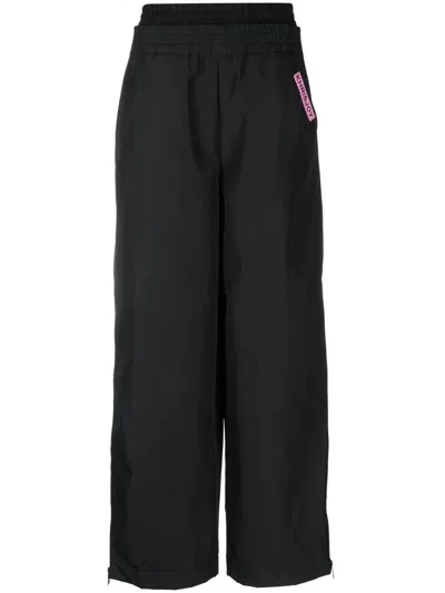 Khrisjoy High-waisted Wide-leg Trousers In Black