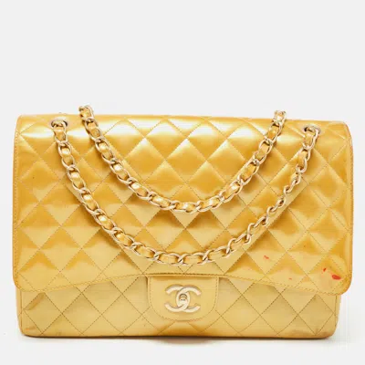 Pre-owned Chanel Quilted Patent Leather Maxi Classic Single Flap Bag In Gold