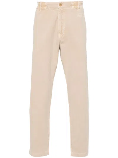 Moschino Logo-embroidered Tapered Trousers In Nude & Neutrals
