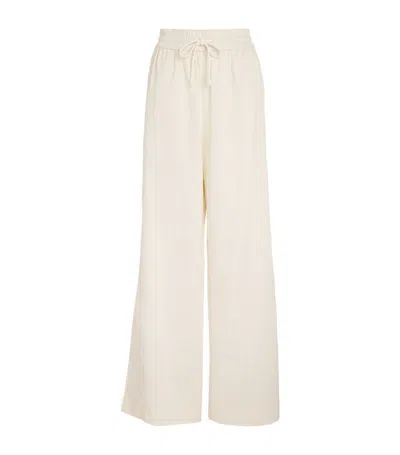 Frame Cotton-linen-blend Wide-leg Trousers In Ivory