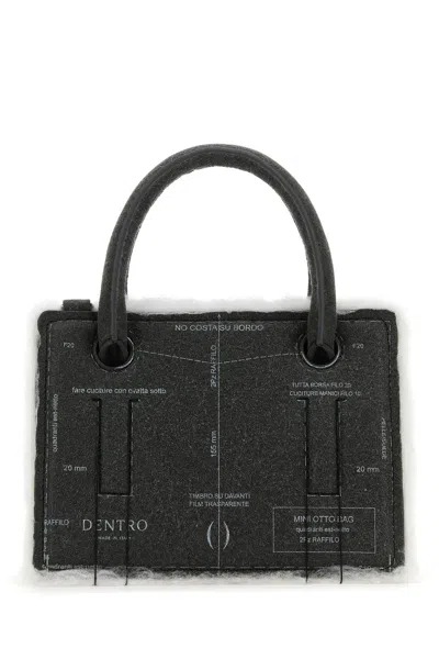 Dentro Handbags. In Grey