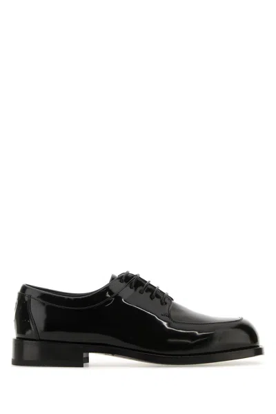 Ferragamo Diamond Glossed-leather Derby Shoes In Black