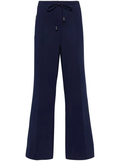 Jw Anderson Bootcut Track Pants In Blue
