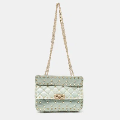 Valentino Garavani Light Quilted Coated Fabric Small Rockstud Spike Top Handle Bag In Blue