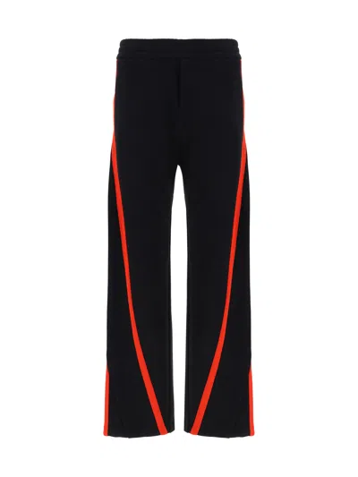 Alexander Mcqueen Twisted Loopback Cotton Sweatpants In Black