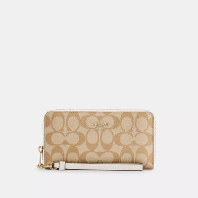 Coach Outlet Long Zip Around Wallet In Signature Canvas In Beige