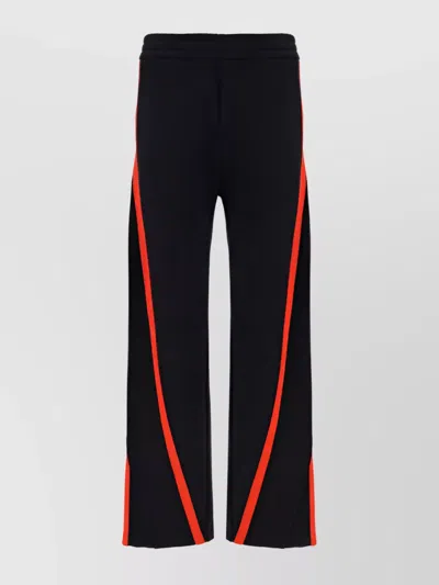 Alexander Mcqueen Twisted Loopback Cotton Sweatpants In Black
