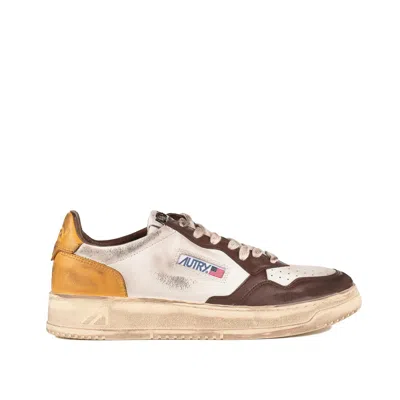 Autry Medalist Low Super Vintage Sneakers In White, Yellow, Brown