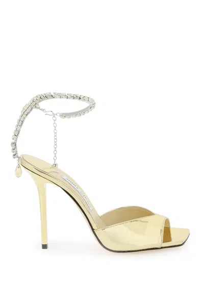 Jimmy Choo Patent Leather Saeda Sandals In Gold