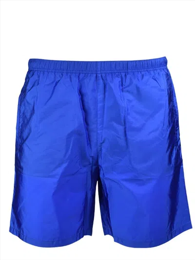 Prada Logo Patch Swim Shorts In Blue