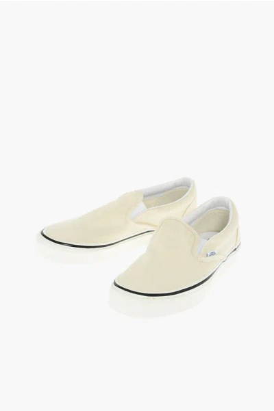 Vans Fabric Classic 9 Slip On Sneakers In Gold