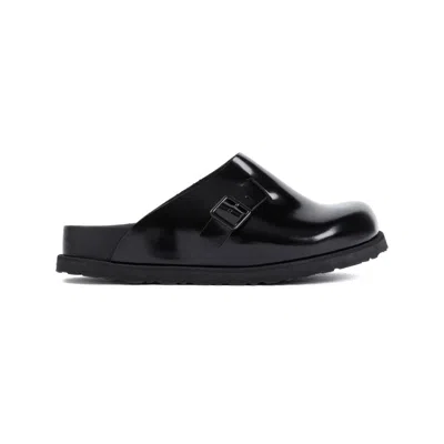 Birkenstock Niamey Buckled Glossed-leather Clogs In Black