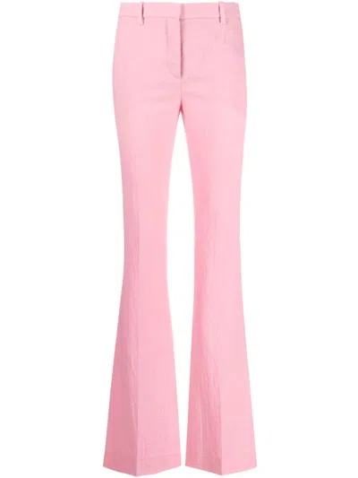 Dua Lipa X Versace Flamingo Pink Allover Logo Flared Trousers For Women