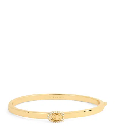 Coach Turnlock Hinged Bangle In Gold