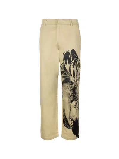 Jw Anderson Graphic-print Straight-leg Trousers In Tan