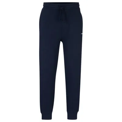 Hugo Cotton-terry Tracksuit Bottoms With Logo Print In Dark Blue