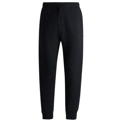 Hugo Boss Stretch-cotton Tracksuit Bottoms With Logo Print In Black