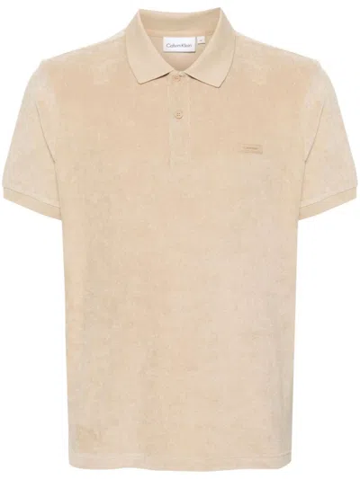 Calvin Klein Rubberised-logo Towelling Polo Shirt In Neutrals
