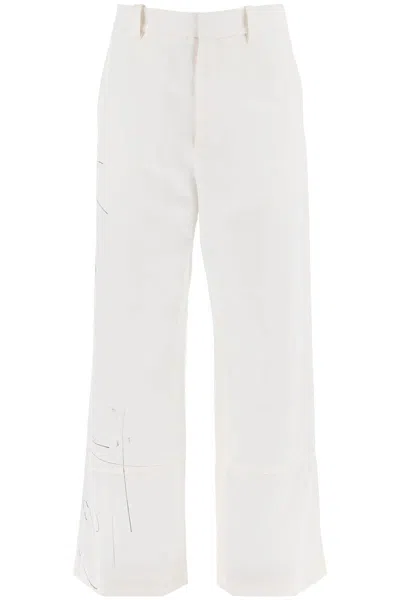 Oamc Wide-legged Scribble Pants In Bianco