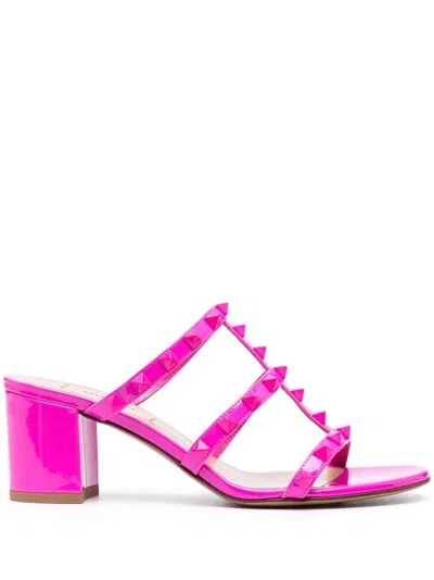 Valentino Garavani Rebellious And Sophisticated: Pink Rockstud Leather Flats For Women