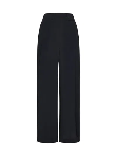 Momoní Trousers In Black