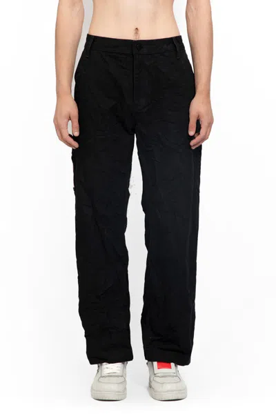 M44 Label Group Trousers In Black