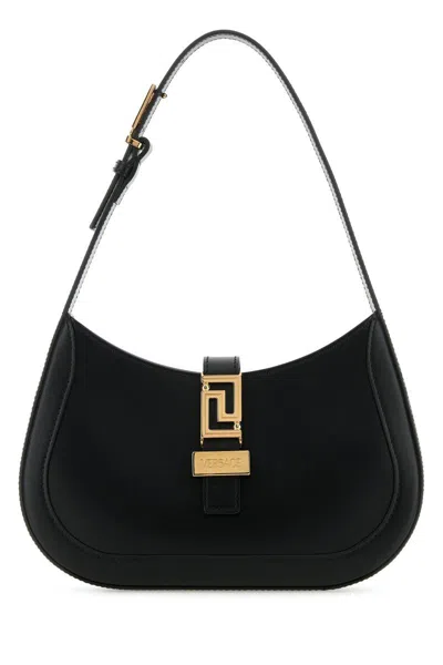 Versace Handbags. In Blackgold
