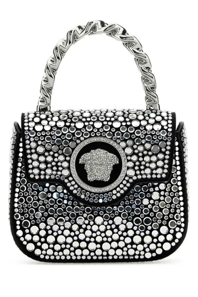 Versace Handbags. In Silver