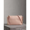 BURBERRY EMBOSSED LEATHER CLUTCH BAG,40596631