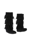 Minnetonka Layered Fringe Suede Boots In Black