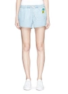 ETRE CECILE Palm tree embroidered cotton shorts