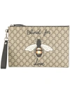 GUCCI GG Supreme pouch with bee,4739049CD1N12361534