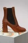 MIU MIU STUDDED LEATHER ANKLE BOOTS,5T180B/S36/5
