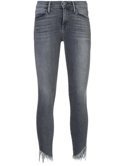 Frame Shredded Hem Jeans In Grey