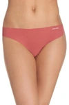 Calvin Klein Invisibles Thong D3428 In Brazen