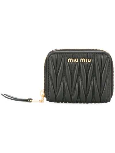 Miu Miu Lettering Logo Zipped Purse In Black