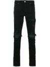 Amiri Slim Fit Distressed Trousers With Rivet Detailing
