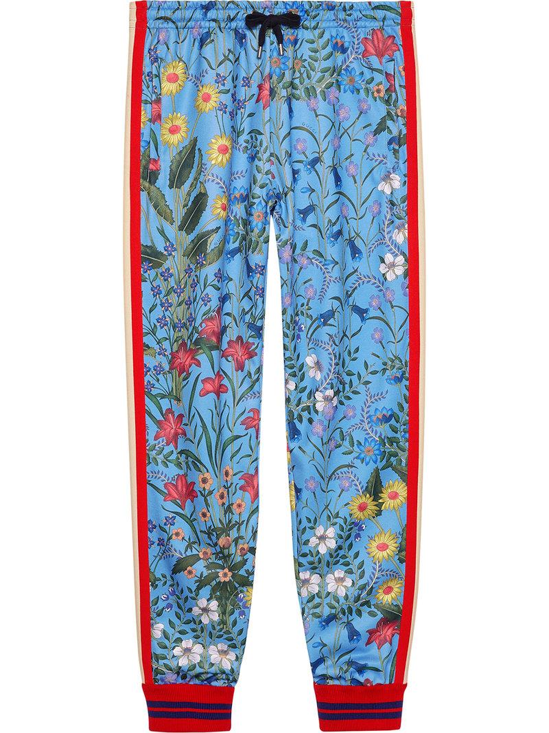 Gucci New Flora Print Jersey Track Pants In Blue / Red | ModeSens