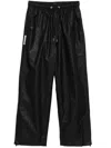 A Bathing Ape Hose Mit Monogramm-print In Schwarz