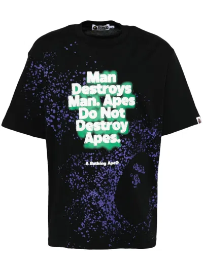 A Bathing Ape Spray-print Slogan T-shirt In Black