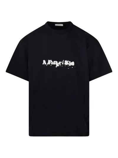 A Paper Kid Paint-splatter Logo T-shirt In Black