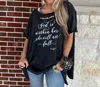 A Rare Bird God Is Within Her Oversized Distressed Tee In Black