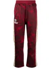 Aape By A Bathing Ape Graphic-print Logo-patch Trousers In Red