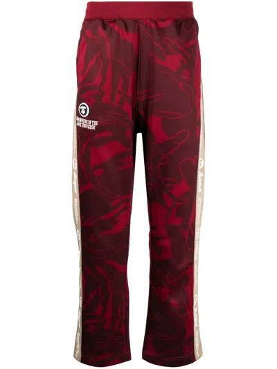 Aape By A Bathing Ape Graphic-print Logo-patch Trousers In Red