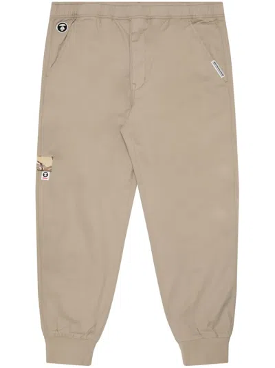 Aape By A Bathing Ape Logo-appliqué Cotton Track Trousers In Nude