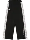 Aape By A Bathing Ape Logo-tape Track Pants In Black