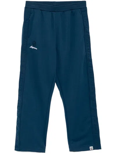 Aape By A Bathing Ape Moonface-logo Track Pants In Blue