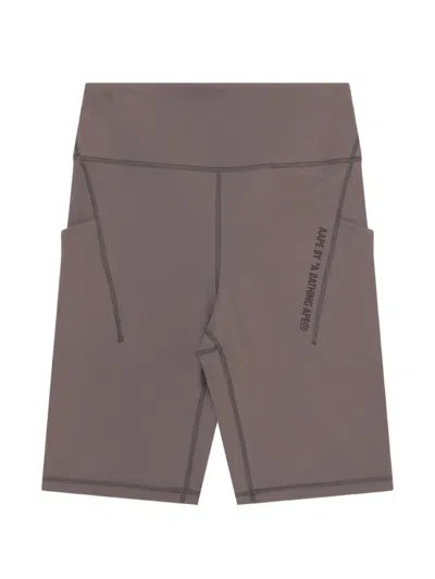 Aape By A Bathing Ape Moonface Printed Biker Shorts In Brown