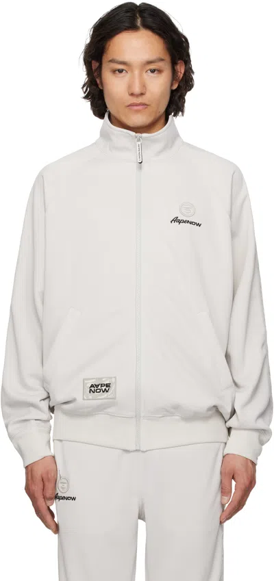 Aape By A Bathing Ape Off-white 'aape Now' Track Jacket In Gyr Grey (yellow)